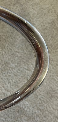 Lot 1117 - A silver bangle, by Hermès