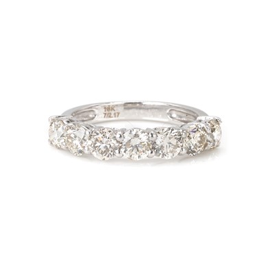 Lot 186 - A white gold diamond half eternity ring