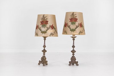 Lot 529 - A pair of silver-plated brass altar candlestick lamps