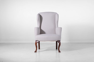 Lot 126 - A George II provincial elm wing armchair