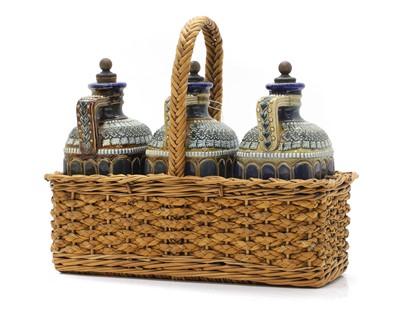 Lot 107 - A Doulton Lambeth stoneware decanter set