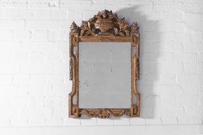 Lot 210 - A neoclassical carved giltwood mirror