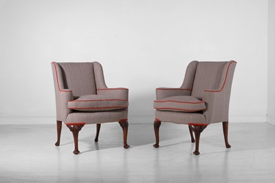 Lot 512 - A pair of George II-style walnut wing armchairs