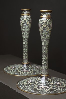 Lot 521 - A pair of Moser enamelled glass candlesticks