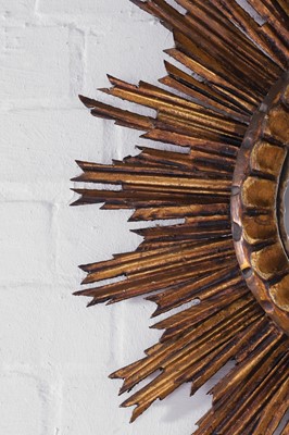 Lot 247 - A giltwood convex sunburst mirror