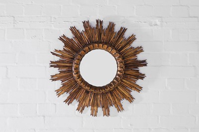 Lot 247 - A giltwood convex sunburst mirror