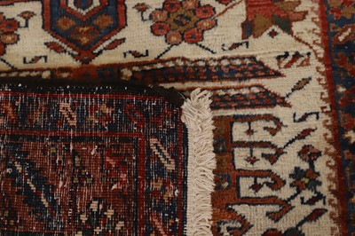 Lot 295 - A near pair of Heriz wool rugs