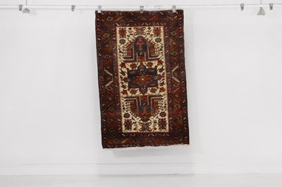 Lot 295 - A near pair of Heriz wool rugs
