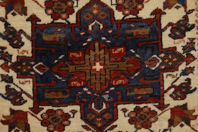 Lot 295 - A near pair of Heriz wool rugs