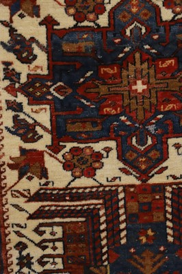 Lot 295 - A near pair of Heriz wool rugs
