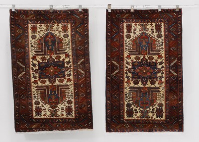 Lot 295 - A near pair of Heriz wool rugs
