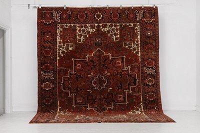 Lot 524 - A Heriz wool carpet