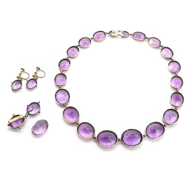 Lot 12 - A Victorian amethyst rivière necklace and earrings set
