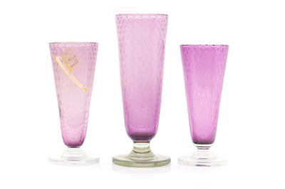 Lot 151 - A set of three Stevens & Williams glass vases