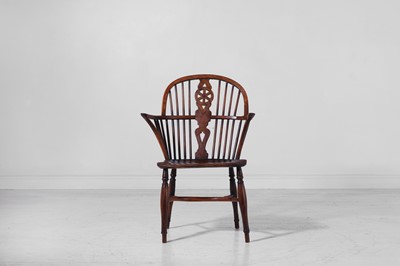 Lot 456 - A George III yew and elm Windsor chair