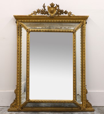 Lot 492 - A cushion wall mirror
