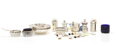 Lot 25 - A pair of silver pepperettes