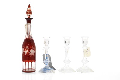 Lot 165 - A set of three Baccarat candlesticks