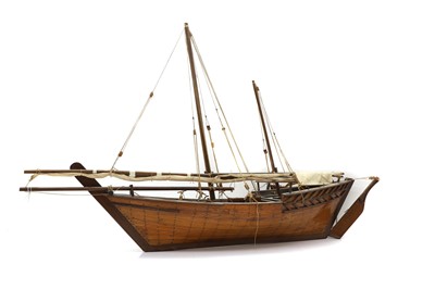 Lot 304 - A scratch built wooden model of a sailing yacht