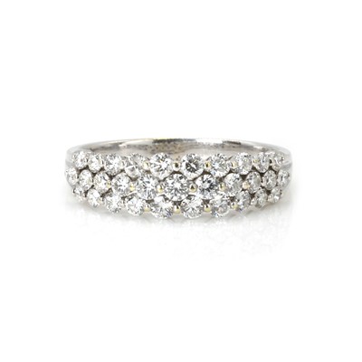 Lot 98 - A diamond three row half eternity ring
