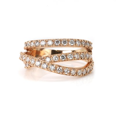 Lot 173 - An 18ct rose gold diamond three row ring