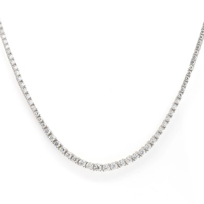 Lot 233 - A diamond line necklace
