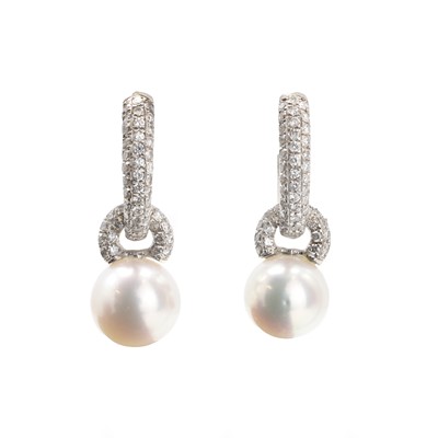 Lot 133 - A pair of cultured pearl and diamond drop earrings