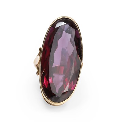 Lot 1099 - A 9ct gold synthetic purple sapphire ring