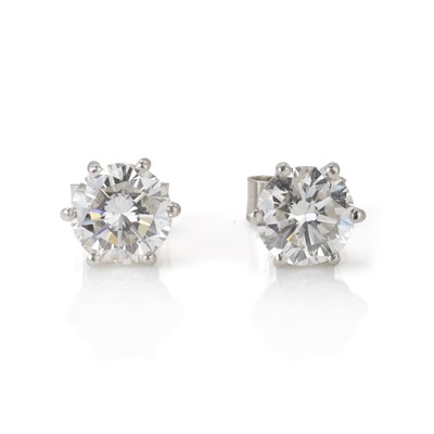 Lot 182 - A pair of diamond single stone stud earrings
