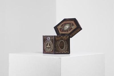 Lot 379 - A George III paper scroll tea caddy