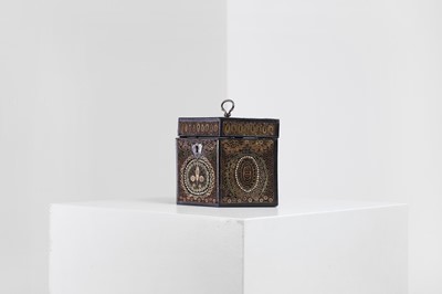 Lot 379 - A George III paper scroll tea caddy