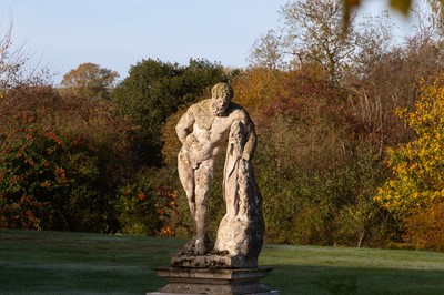 Lot 124 - A carved limestone statue after the antique