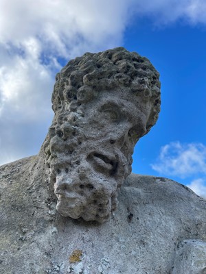 Lot 124 - A carved limestone statue after the antique