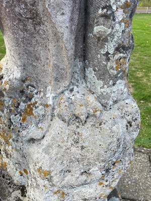 Lot 124 - A carved limestone statue after the antique