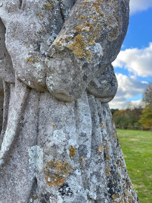 Lot 124 - A carved limestone statue after the antique