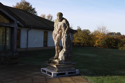 Lot 124 - A carved limestone statue after the antique