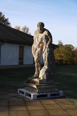 Lot 124 - A carved limestone statue after the antique