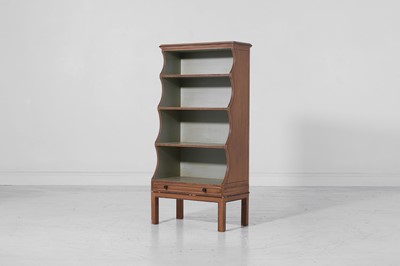 Lot 53 - A Regency-style painted wooden waterfall bookcase