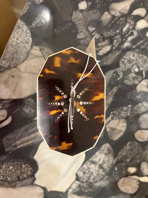 Lot 388 - A George III tortoiseshell, ivory and mother-of-pearl inlaid tea caddy