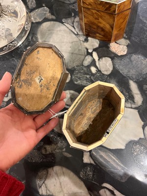 Lot 388 - A George III tortoiseshell, ivory and mother-of-pearl inlaid tea caddy