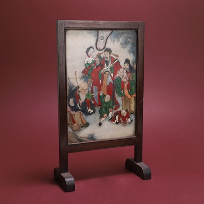 Lot 174 - A carved hardwood table screen