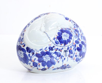 Lot 54 - A Chinese porcelain Buddha