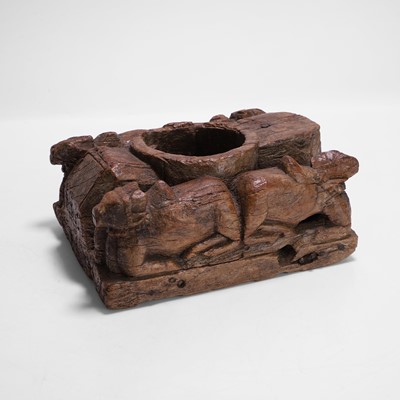 Lot 40 - An Indian carved wood mortar or spice box