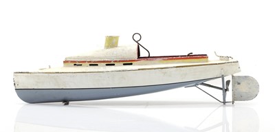 Lot 58 - An unusual early tin live steam racing boat