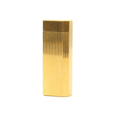 Lot 1327 - A gold plated lighter, by Cartier