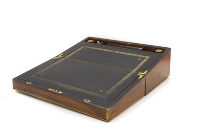 Lot 309 - A Victorian walnut and brass bound writing slope