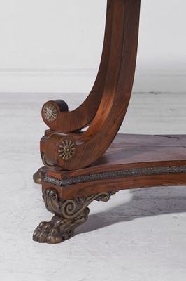 Lot 245 - A Regency kingwood and brass centre table