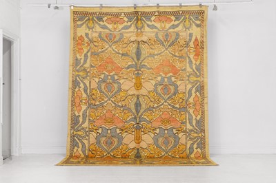 Lot 26 - A wool carpet of Arts and Crafts design