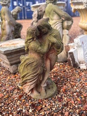 Lot 561 - A reconstituted garden figure of lovers