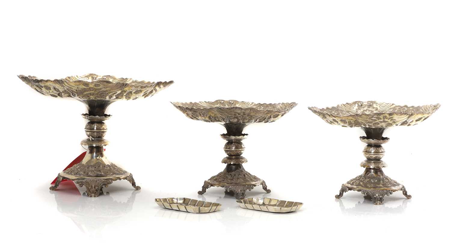 Lot 7 - A Victorian garniture of three silver comports